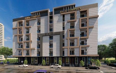 Seven-storey residential block with balconies, signed Anum Complex